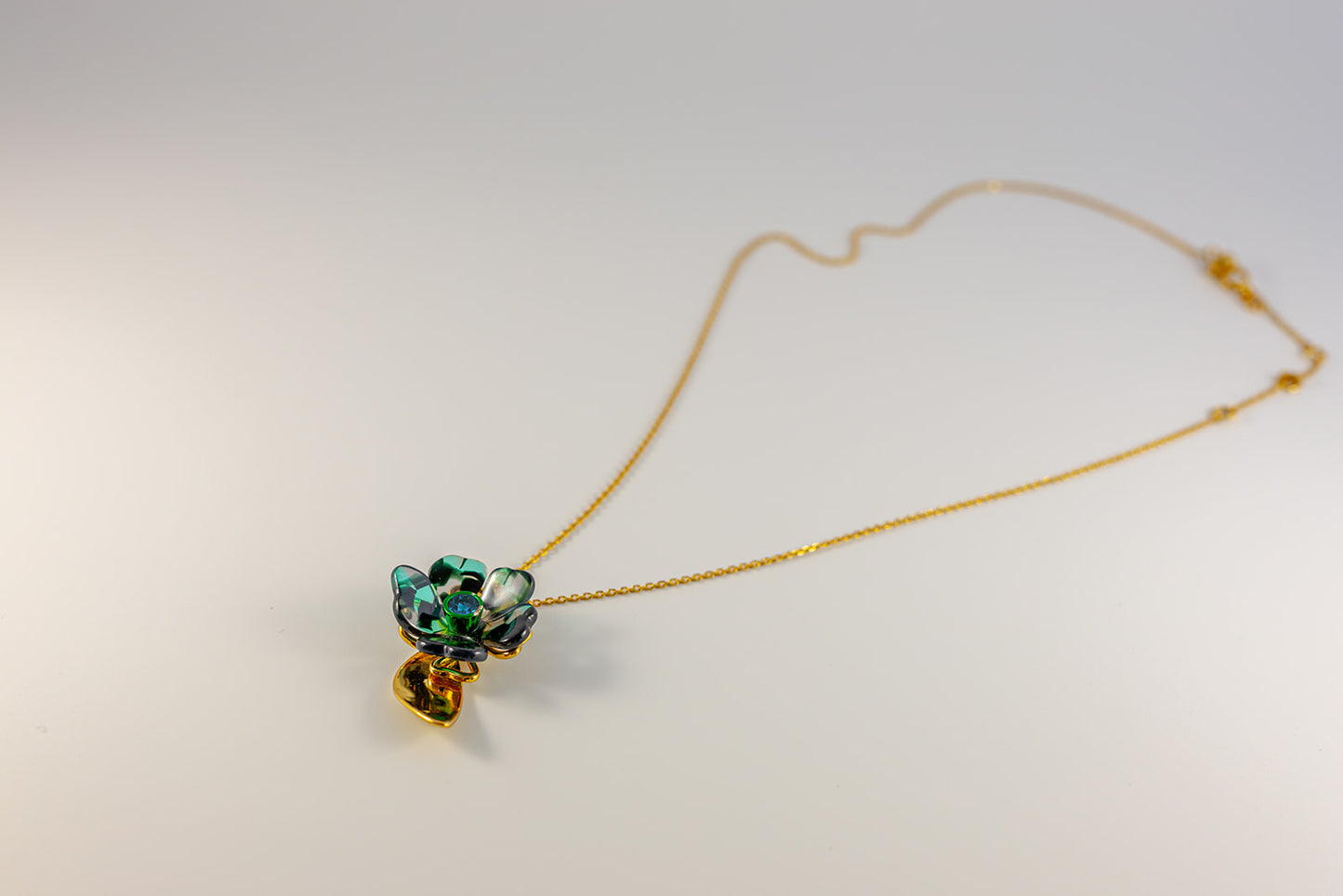 Gold Chain Necklace with Green and Black Floral Pendant