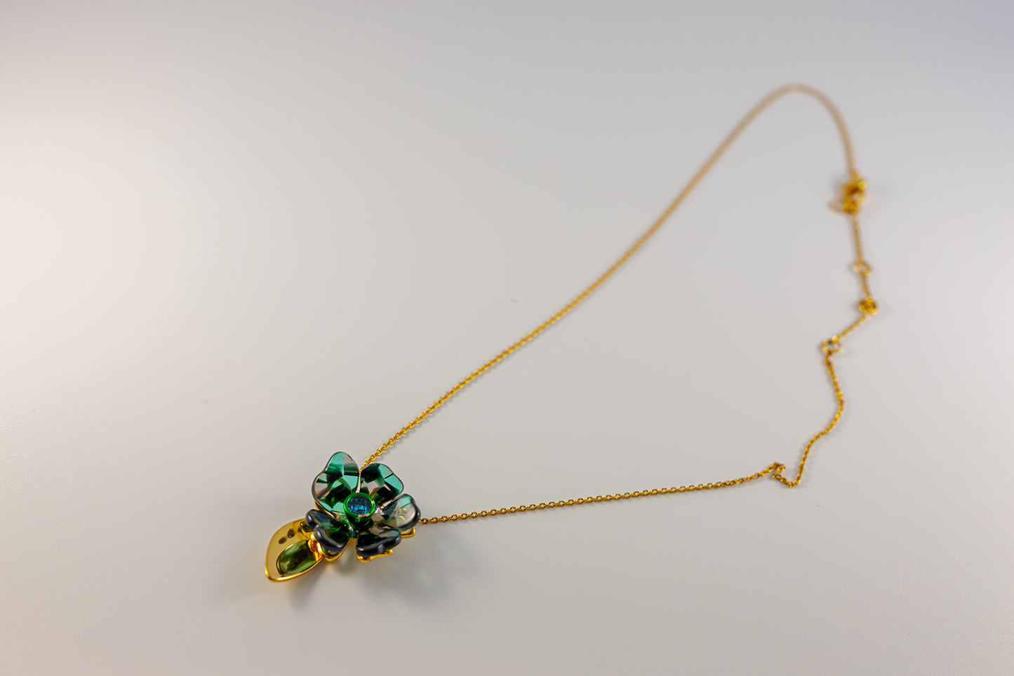 Gold Chain Necklace with Green and Black Floral Pendant