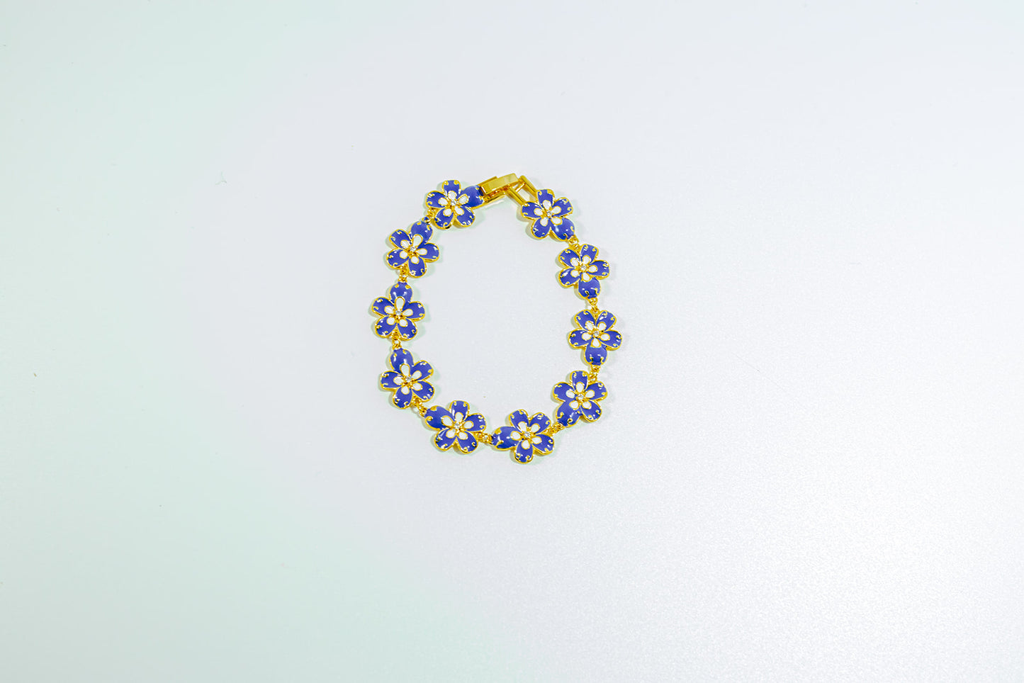 Gold-Tone Bracelet with Cobalt Blue Flowers