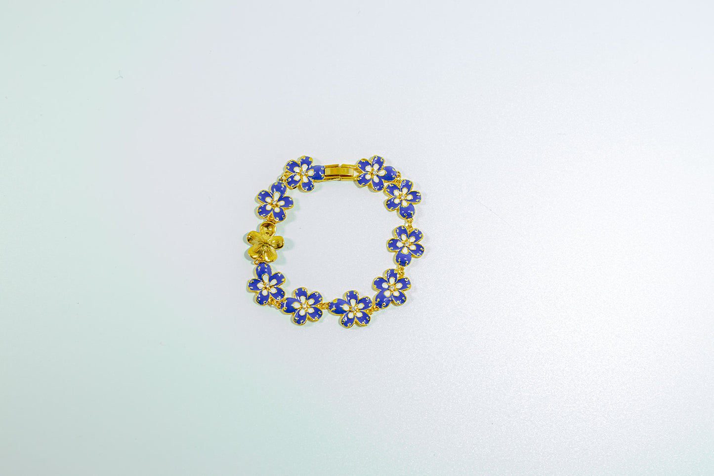 Gold-Tone Bracelet with Cobalt Blue Flowers