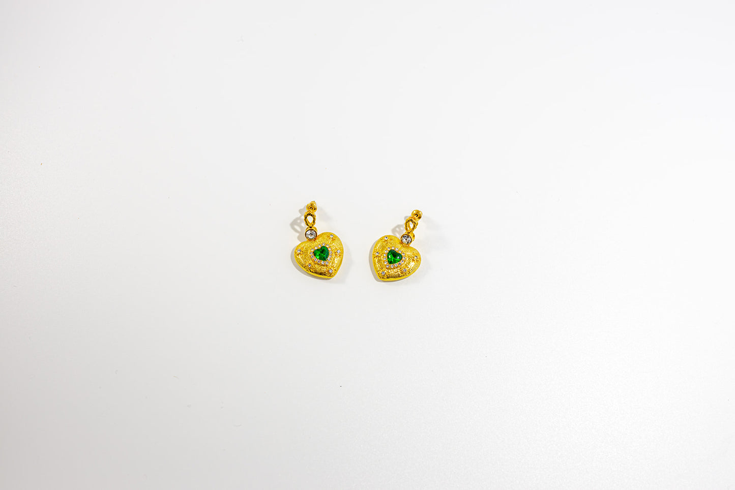 Gold Heart-Shaped Earrings with Green Gemstones