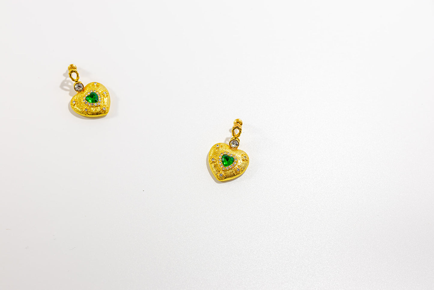 Gold Heart-Shaped Earrings with Green Gemstones