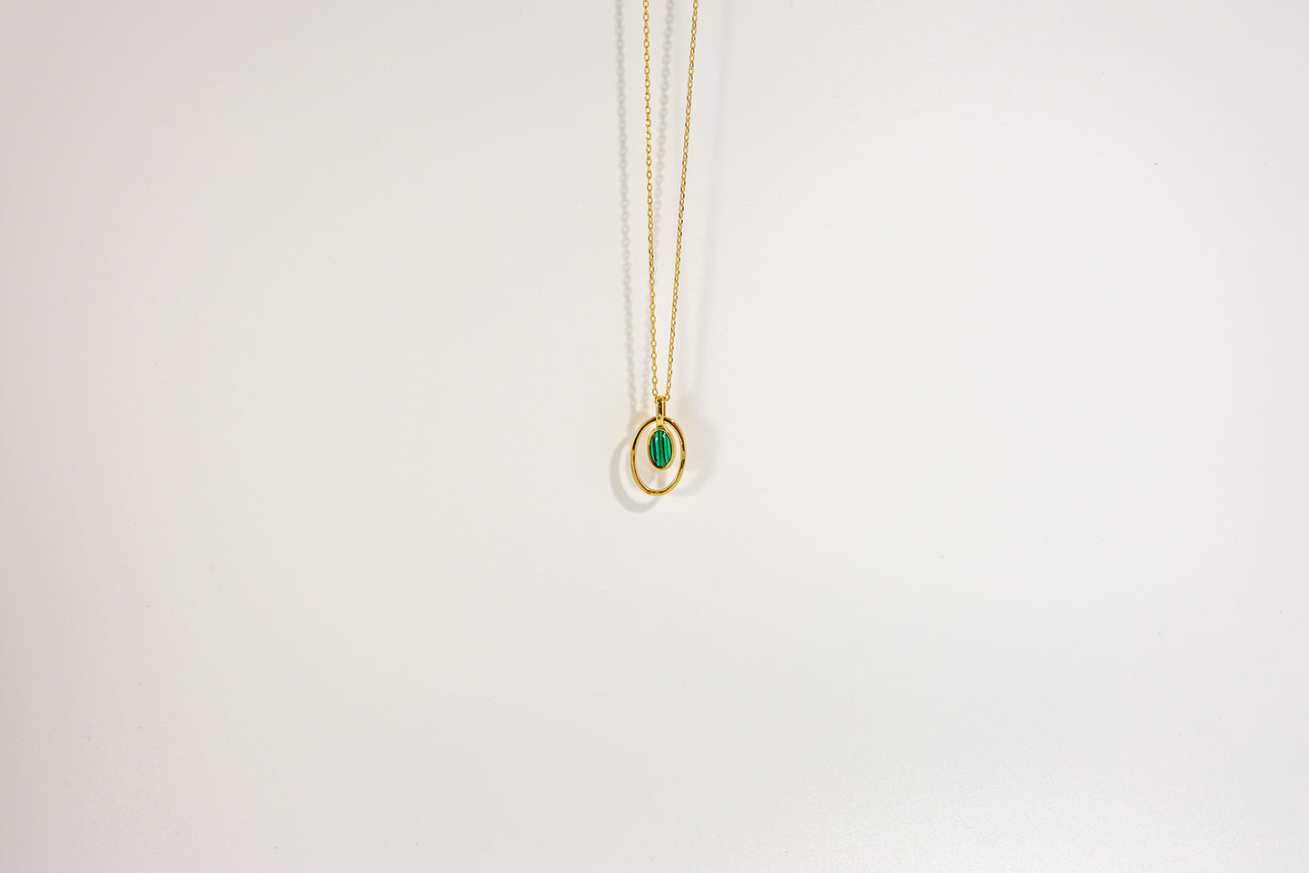 Gold Necklace with Oval Pendant Green Gemstone