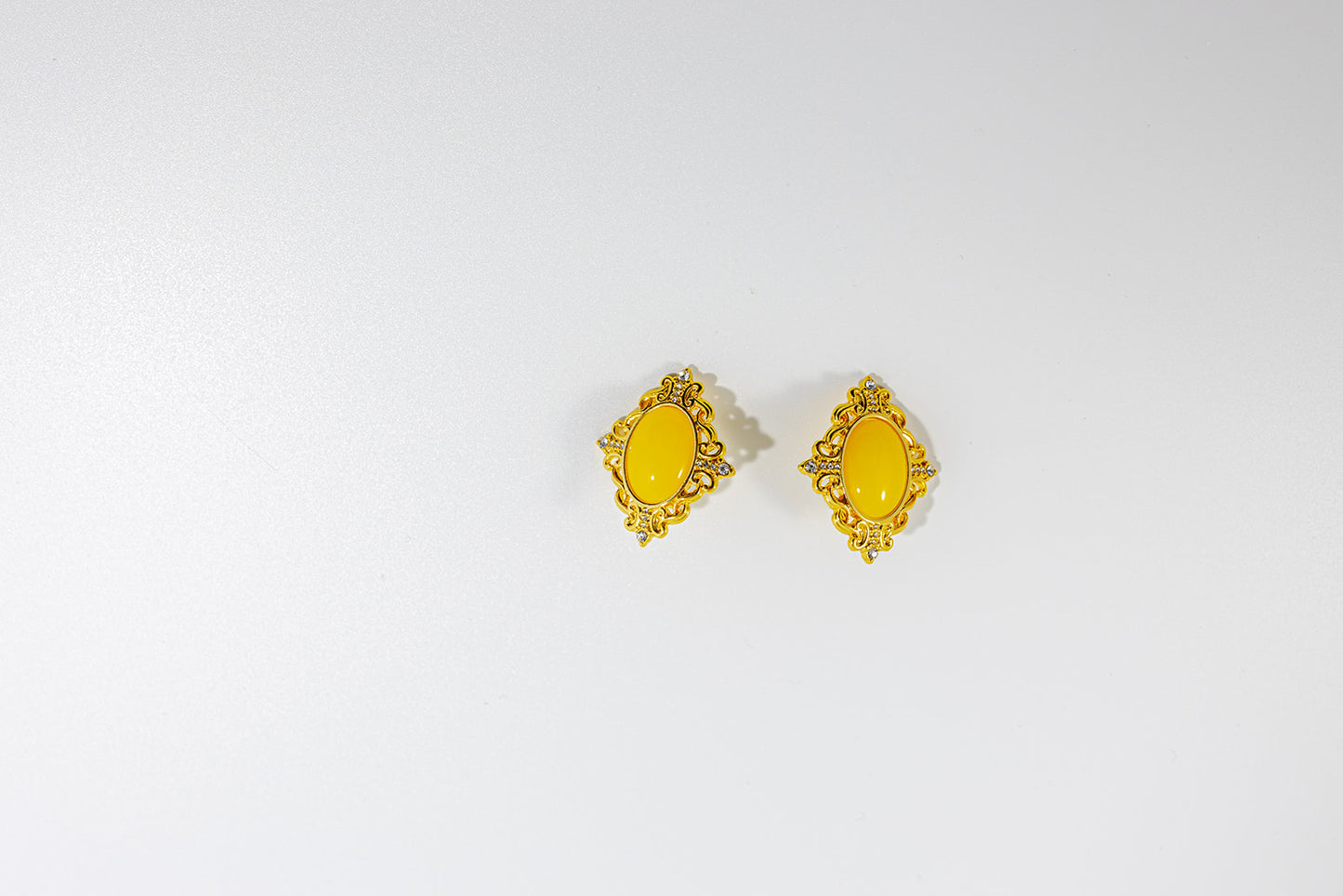 Diamond Shape Stud Earring with Oval Yellow Gemstone