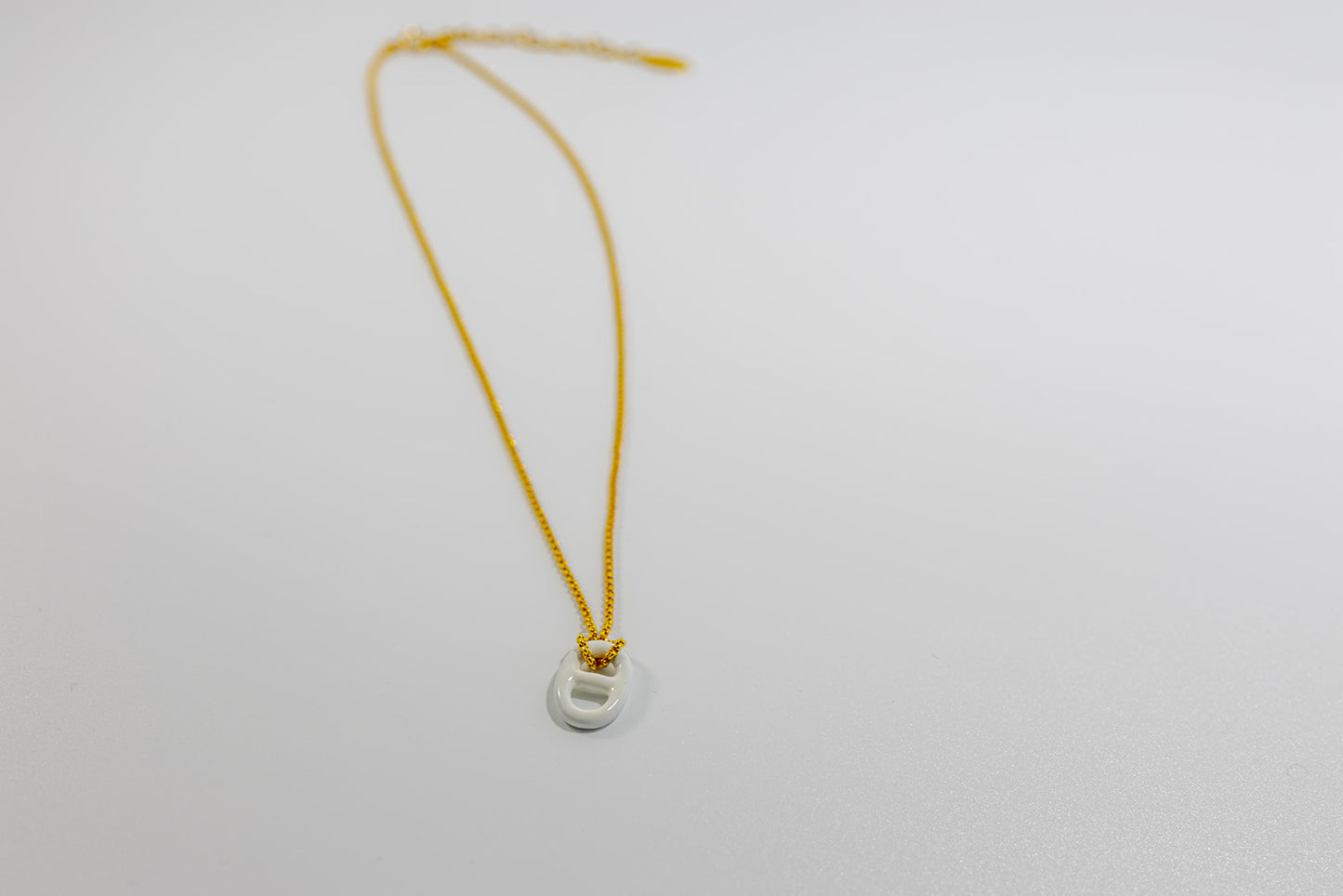 Gold Necklace with White Pendant