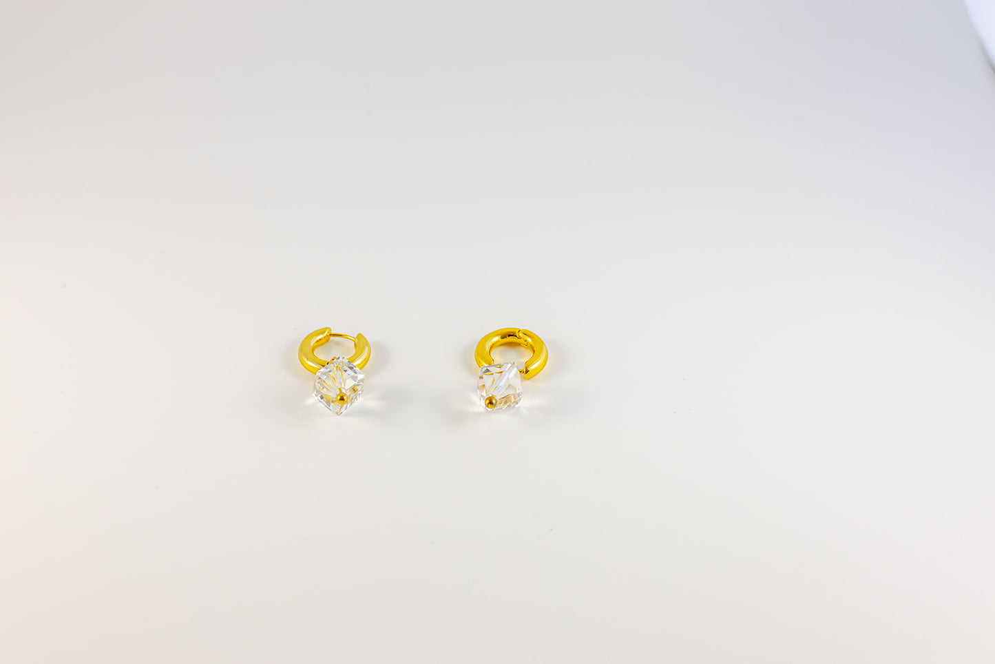 Gold Hoop Earrings with Pear-Shaped Gemstone