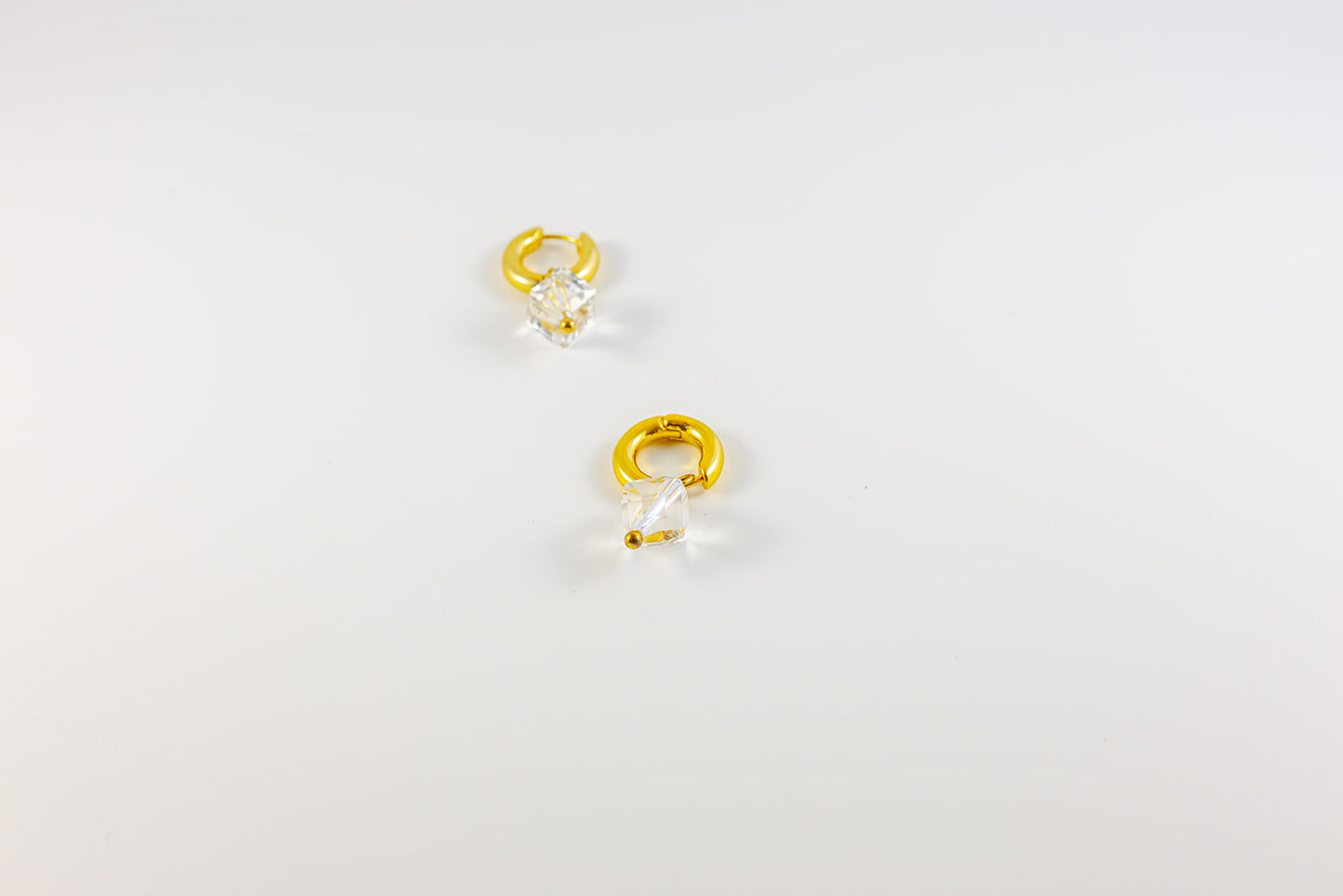 Gold Hoop Earrings with Pear-Shaped Gemstone