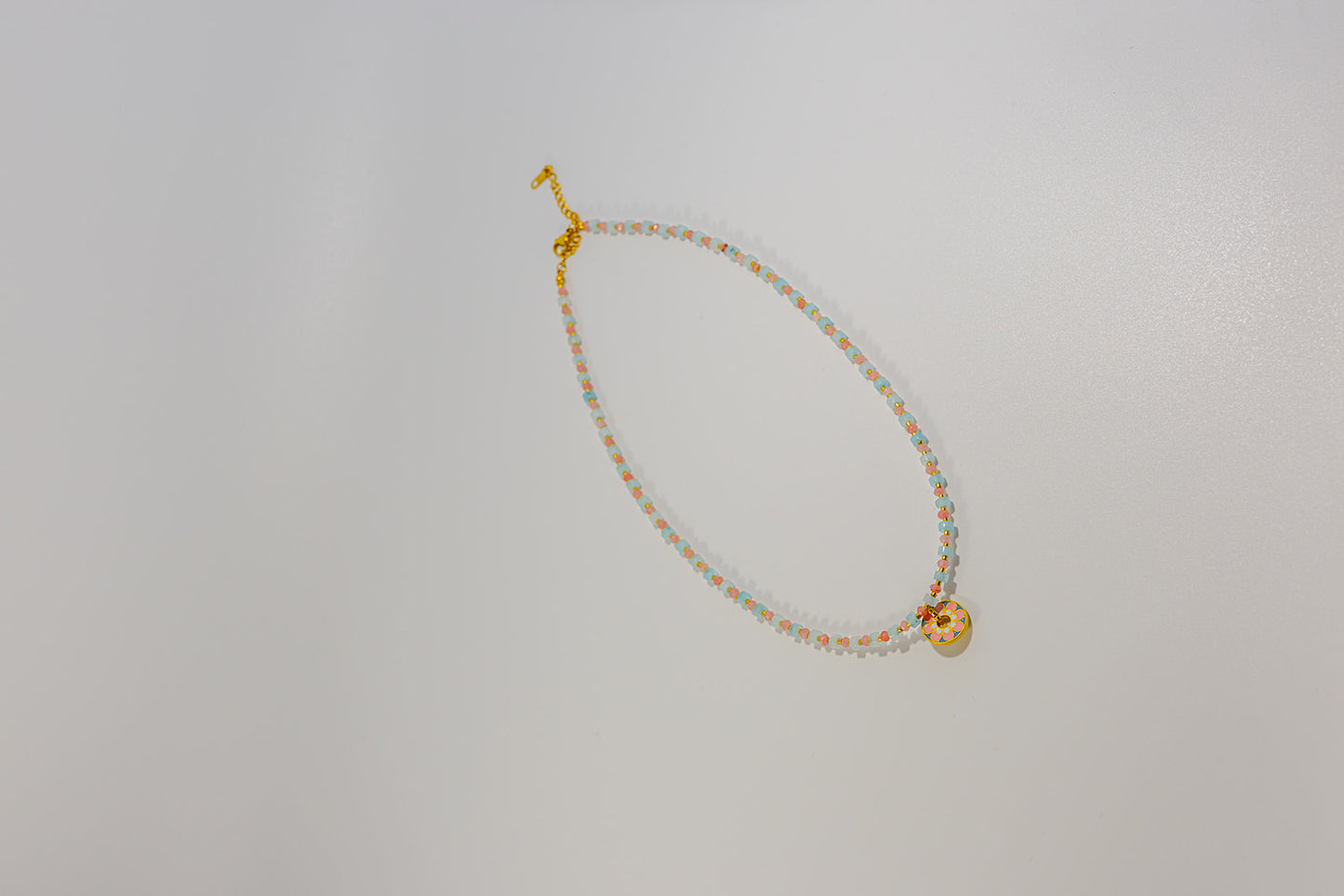 Beaded Necklace with Flower Pendant