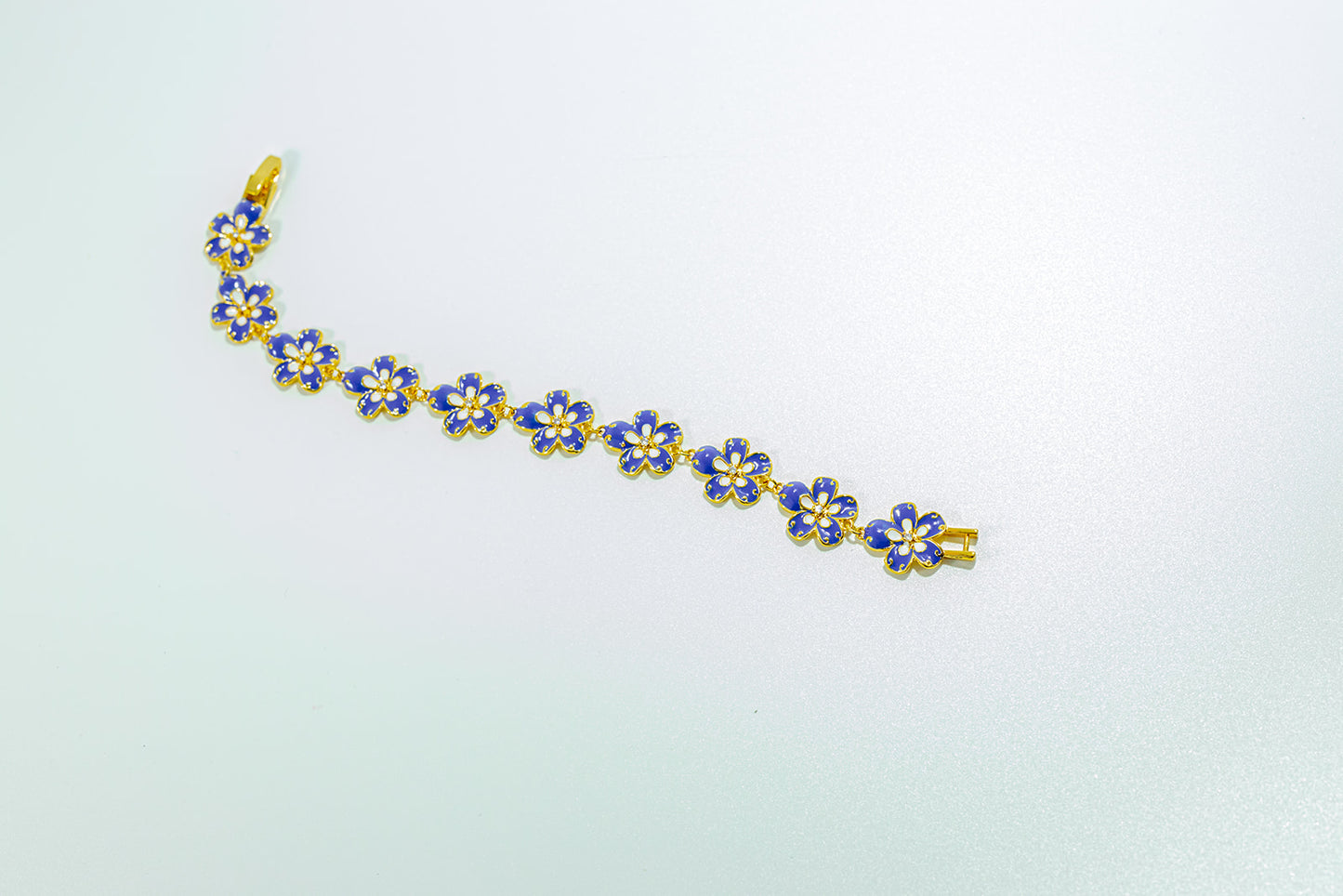 Gold-Tone Bracelet with Cobalt Blue Flowers