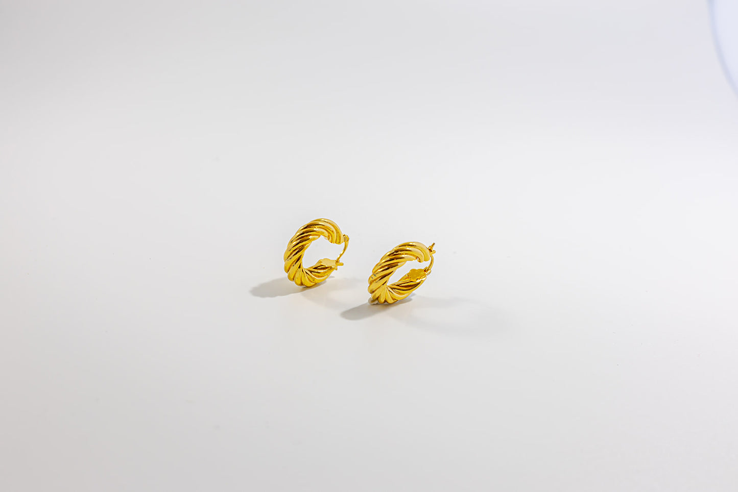 Yellow Gold Twisted Round Hoop Earrings