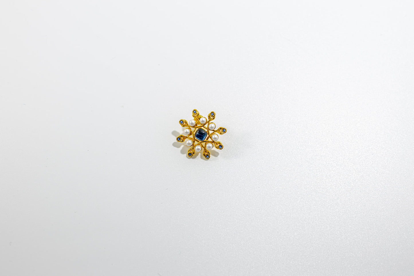 Vintage Snow Flake with Blue Stone