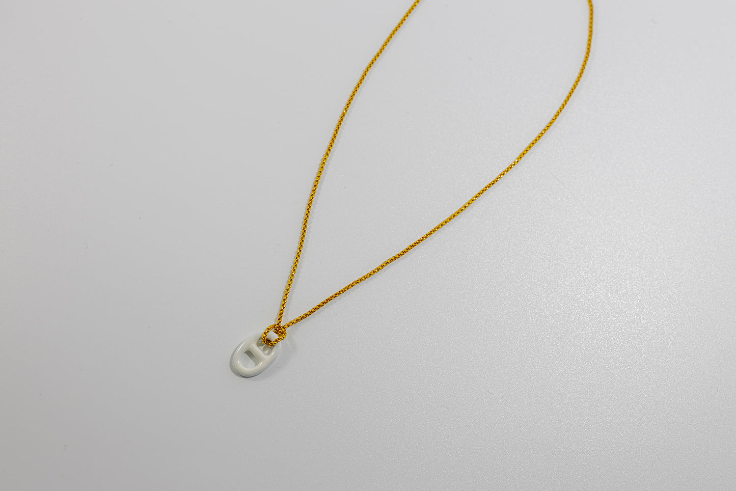 Gold Necklace with White Pendant