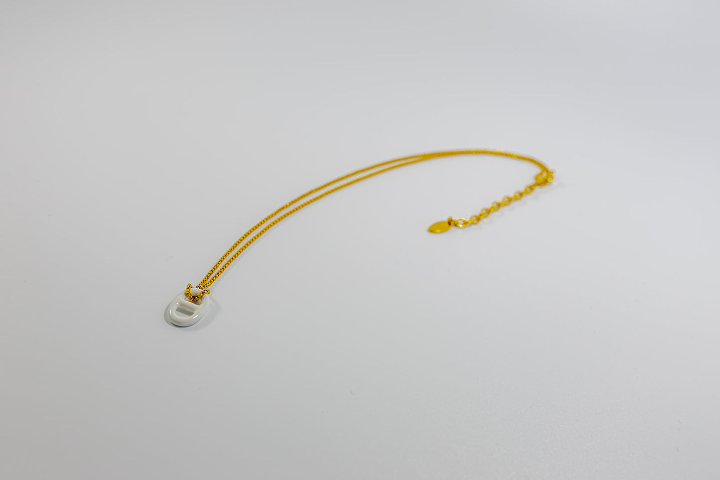 Gold Necklace with White Pendant
